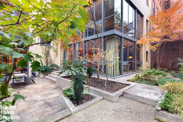 This is. a photo of the backyard of an NYC townhouse